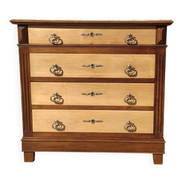 Old chest of drawers with white marble.