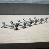 6 anciens porte-couteaux teckel en métal
