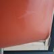 2 orange faux leather swivel chairs