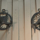 Pair of carved metal wall lamps signed RG