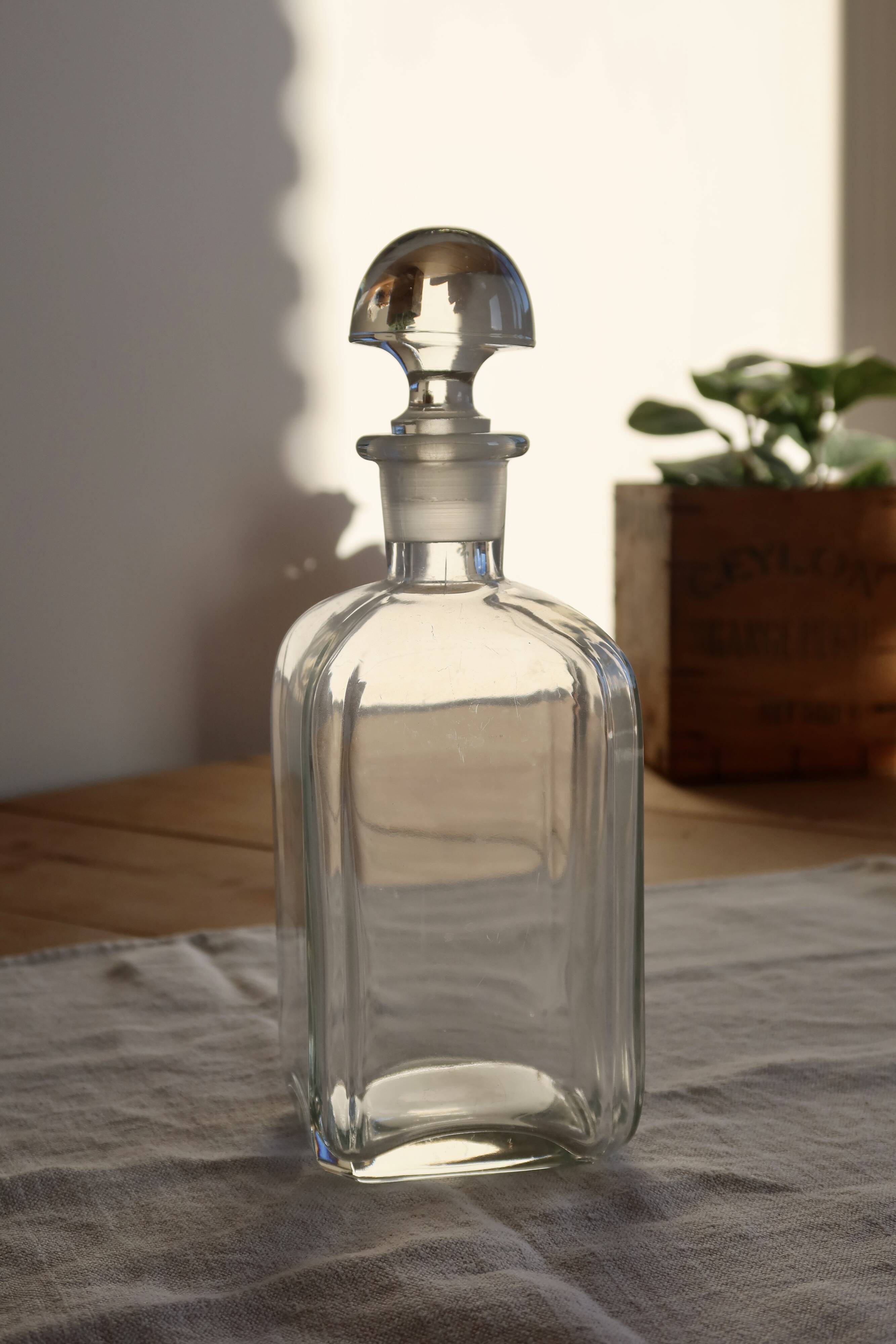Antique glass carafe with stopper