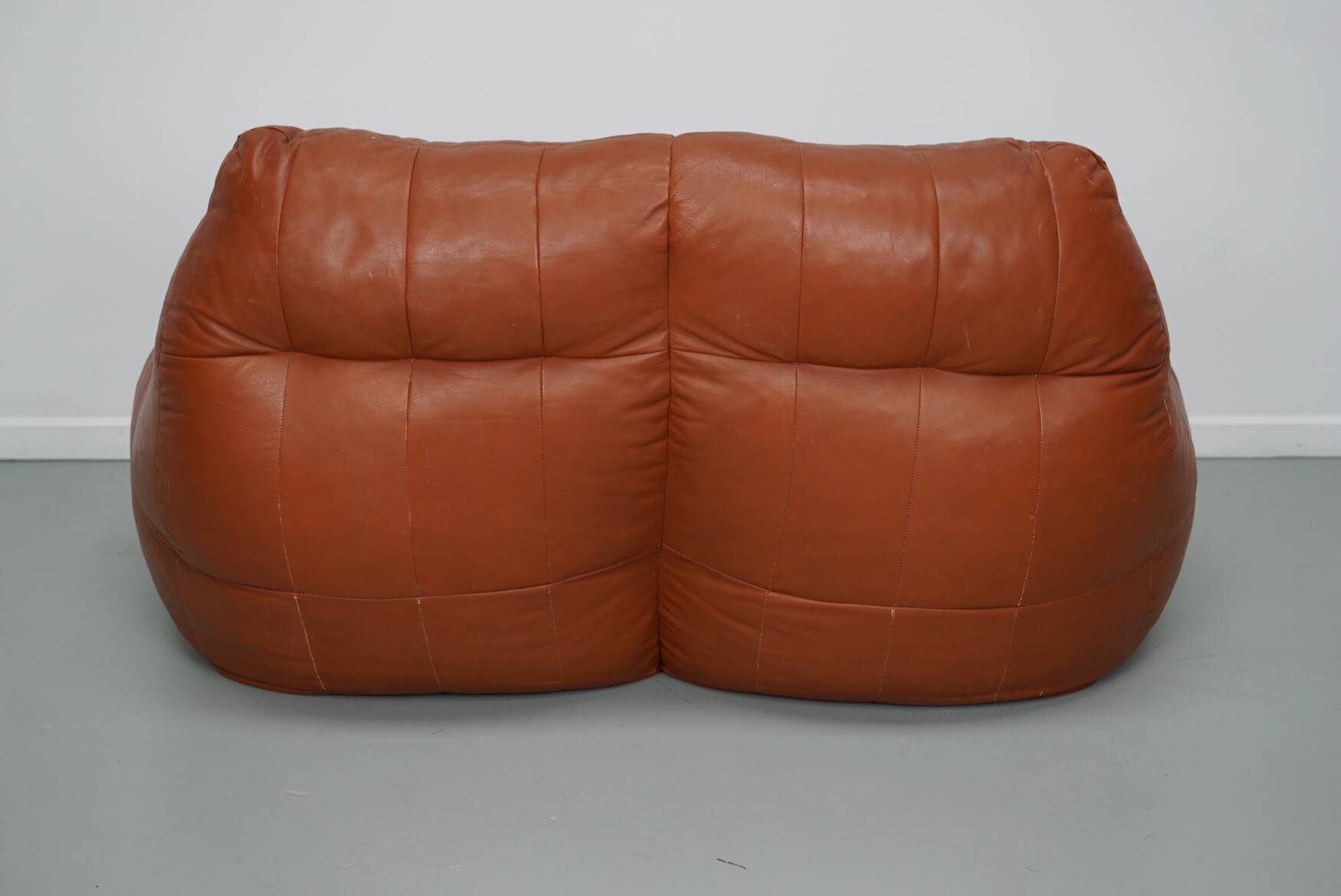 Pouf / Canapé 2 places en cuir patchwork vintage