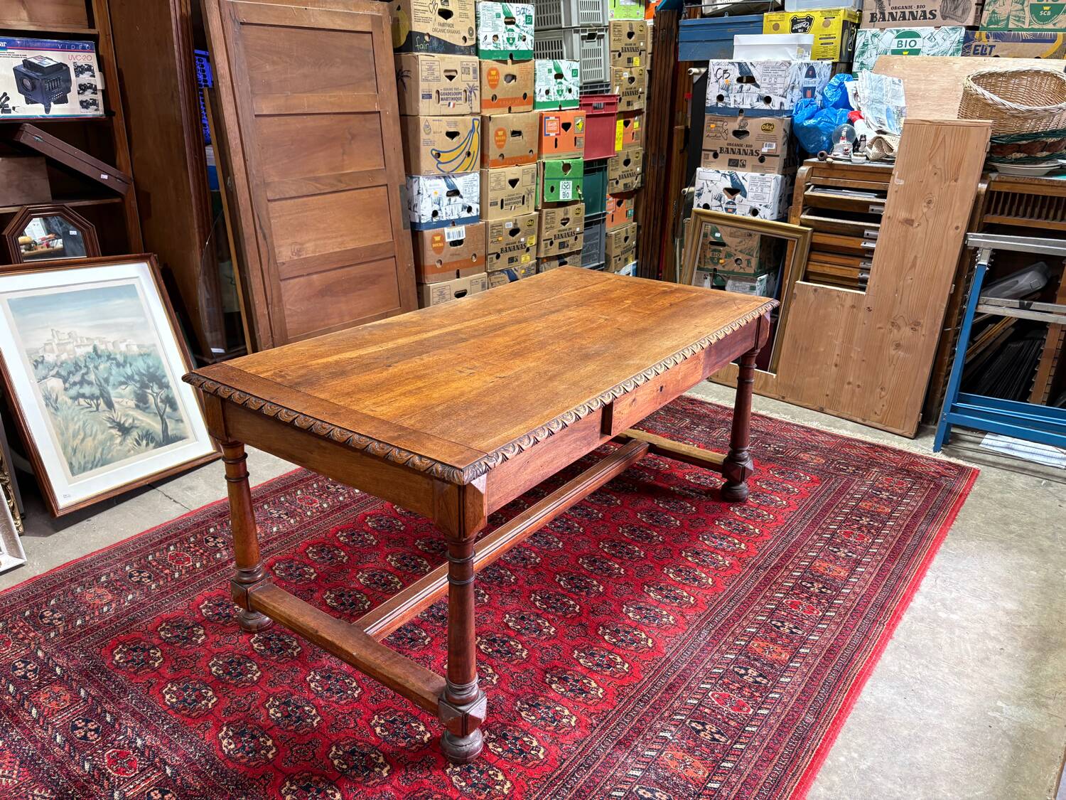 Large antique carved wooden desk in Renaissance style