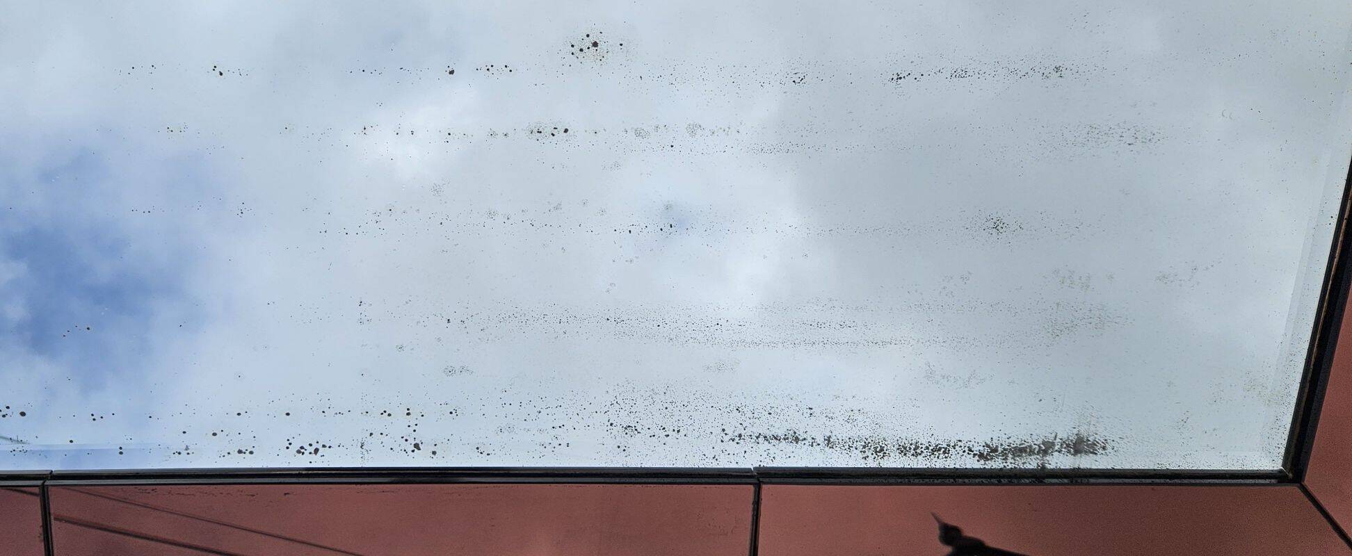 Amber-Colored Mirror with Visor, Jacques Adnet Style, Circa 1950