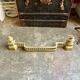 Fireplace fender in gilded bronze