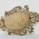 Miroir ovale en métal doré de style rococo, Italie, 20e siècle