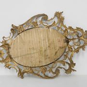 Miroir ovale en métal doré de style rococo, Italie, 20e siècle