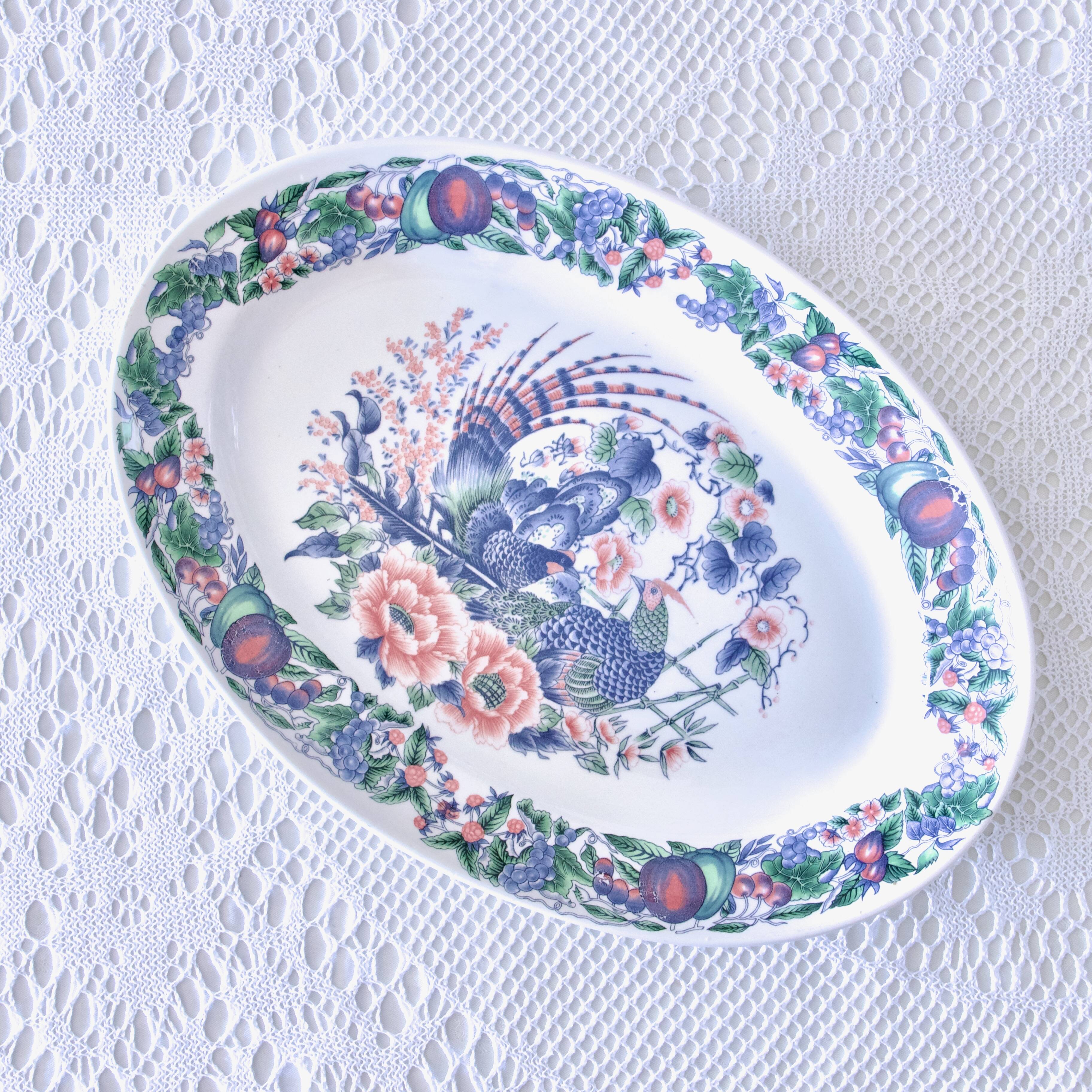 Large vintage Italian oval dish decorated with birds, flowers and fruits