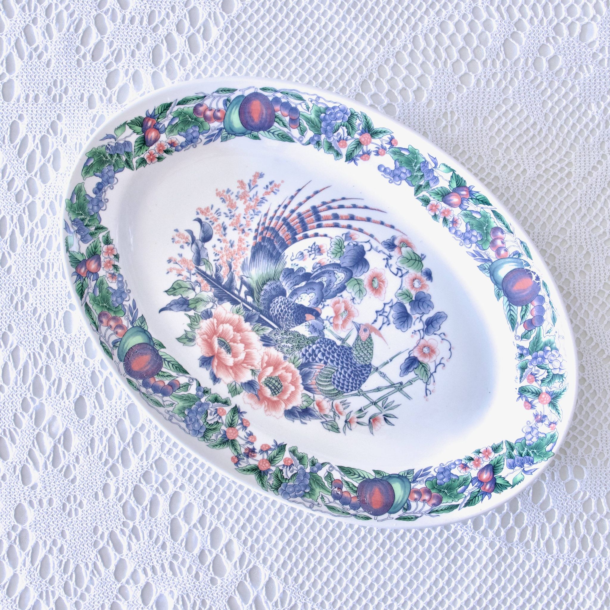 Large vintage Italian oval dish decorated with birds, flowers and fruits