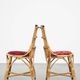 Set of 4 subtle and charming vintage 60s rattan boho chairs with colorful upholstered seats
