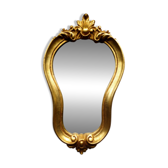 Baroque style gilded mirror.