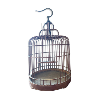 Old bird cage made of bamboo and wood