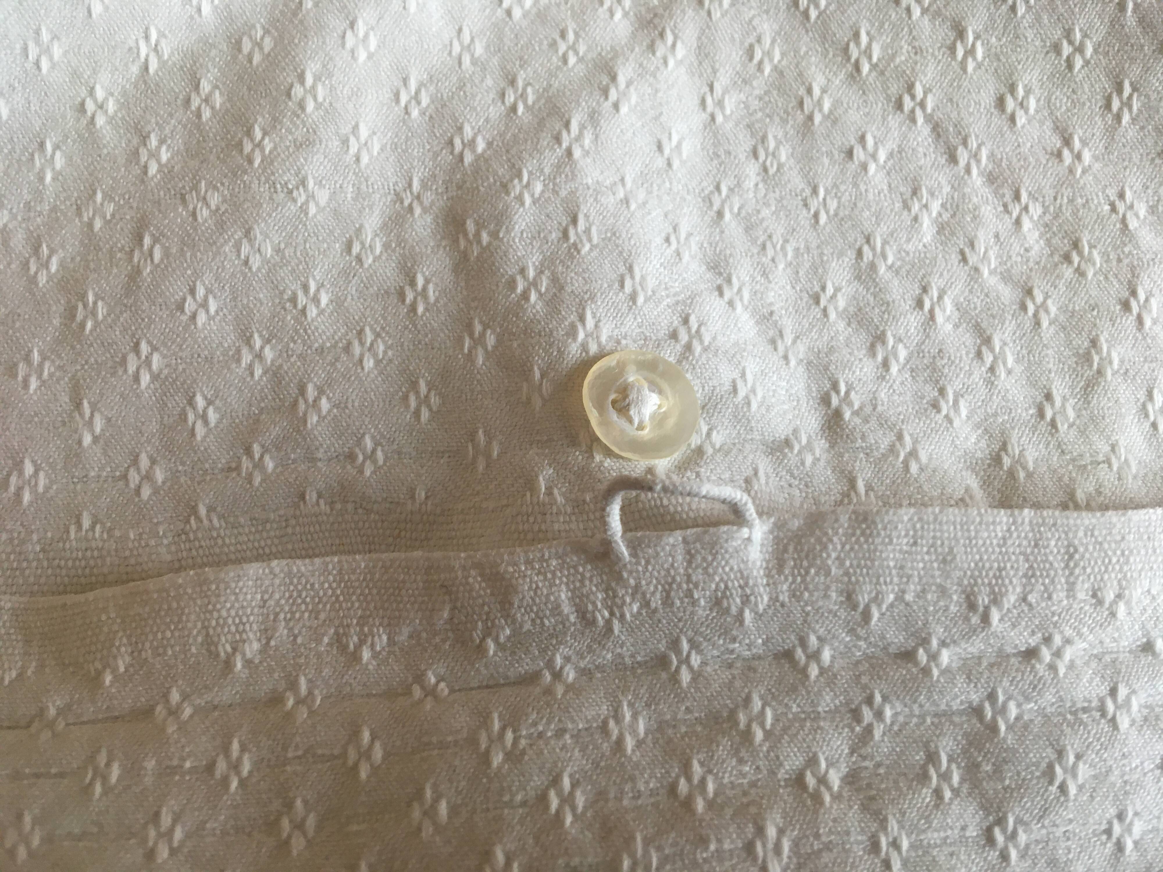 A handmade lace cushion cover