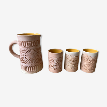 Pitcher and its 3 ochre terracotta pots