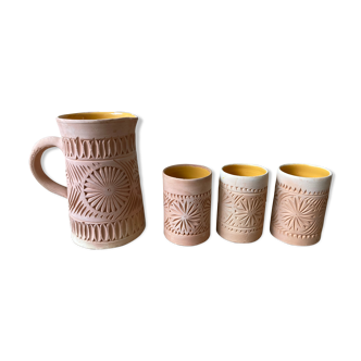 Pitcher and its 3 ochre terracotta pots