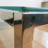 Coffee table in glass and chromed metal