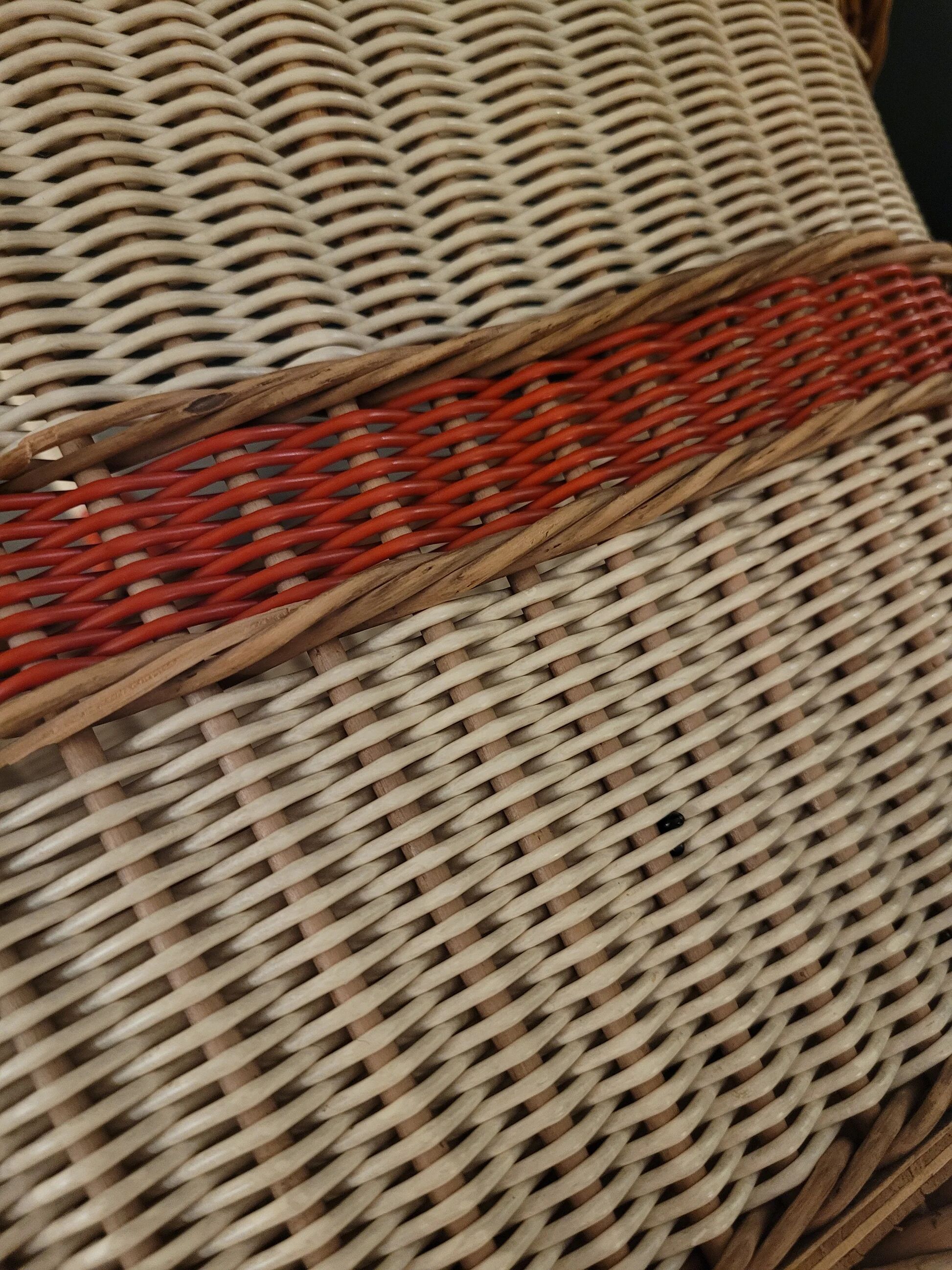 Old oval basket with a wooden base