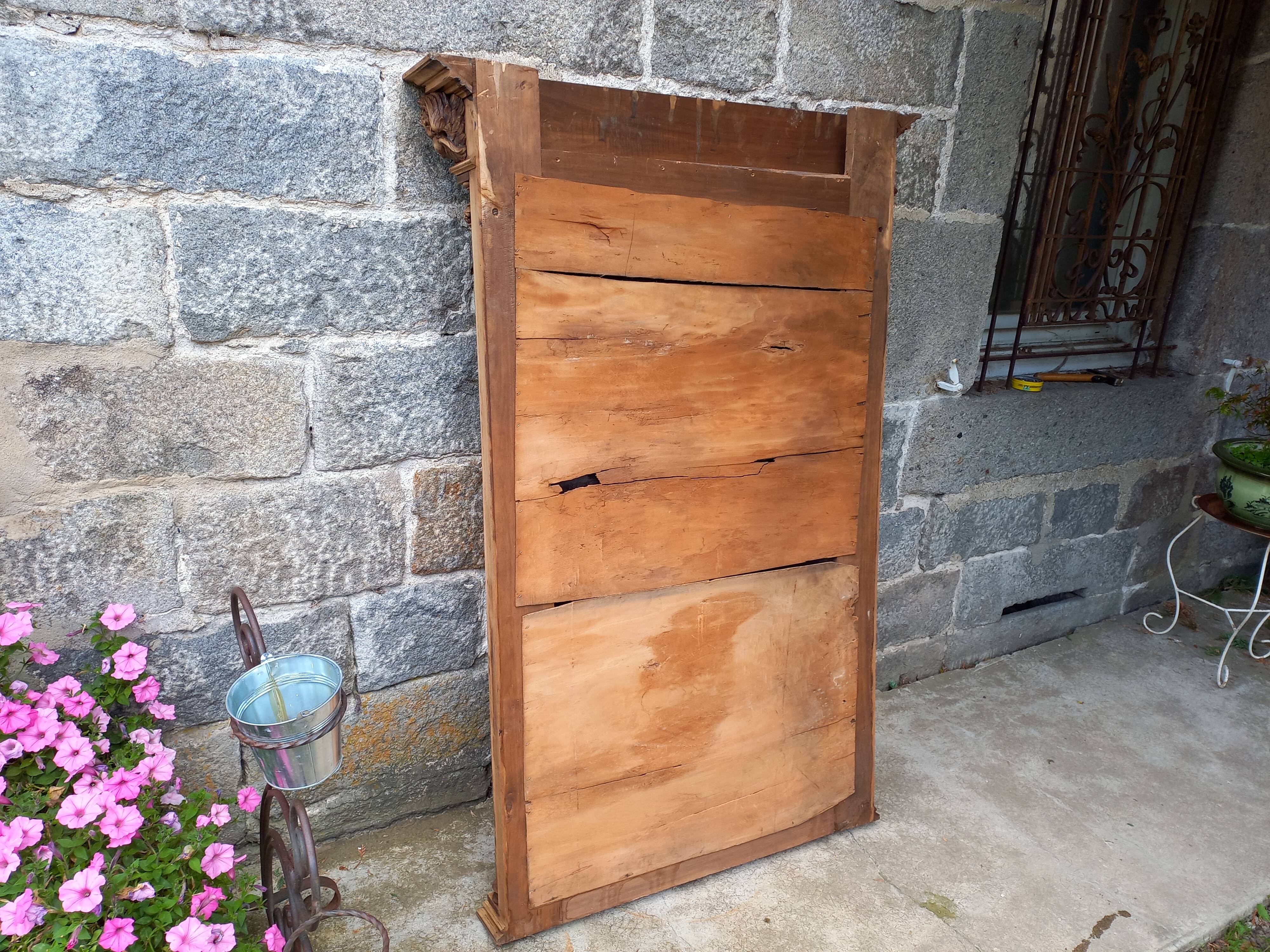 Carved wooden mirror, 168x112 cm