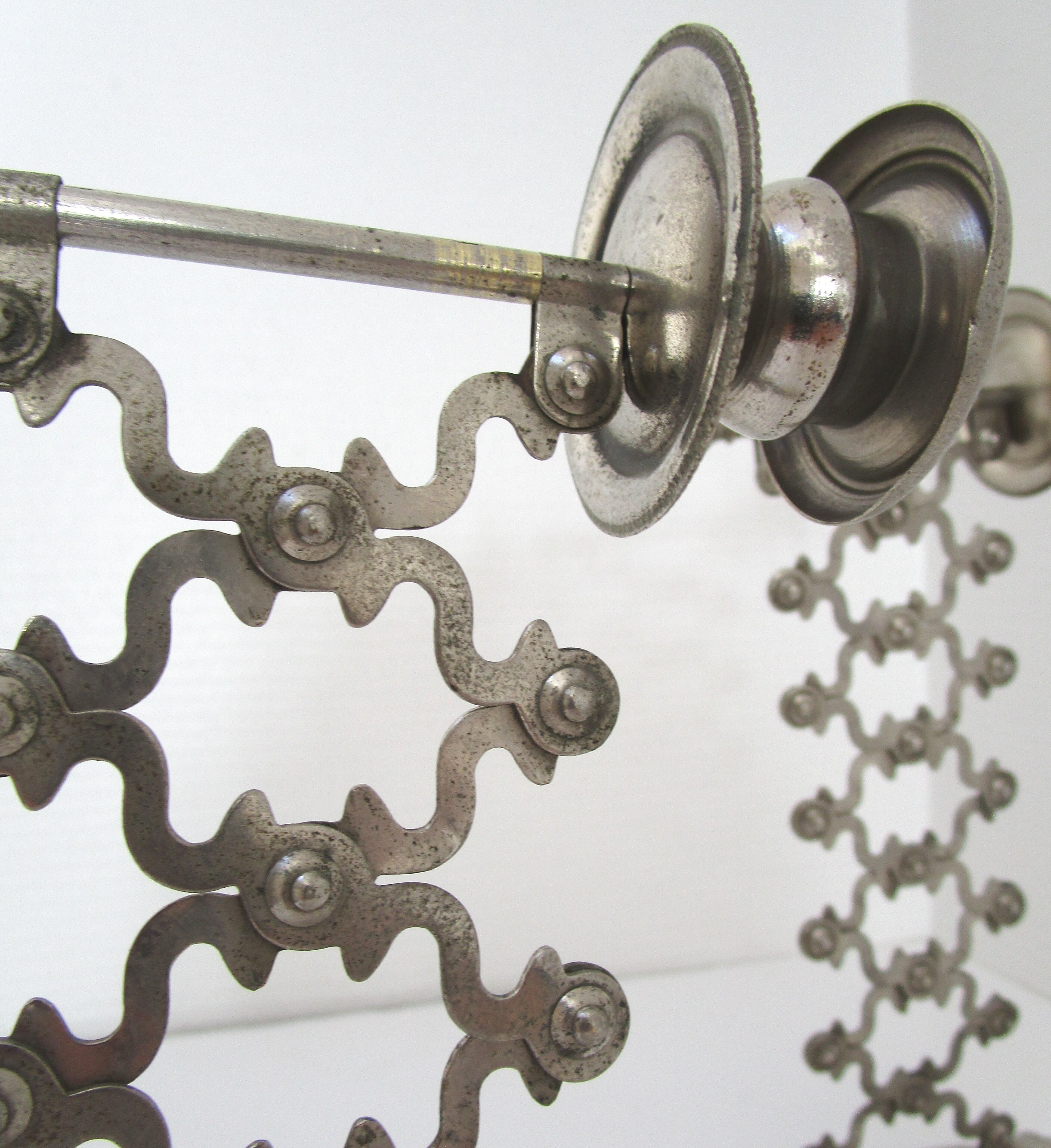 Pair of extendable old metal candlesticks