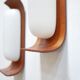 Pair of teak and opaline wall lamps by Goffredo Reggiani