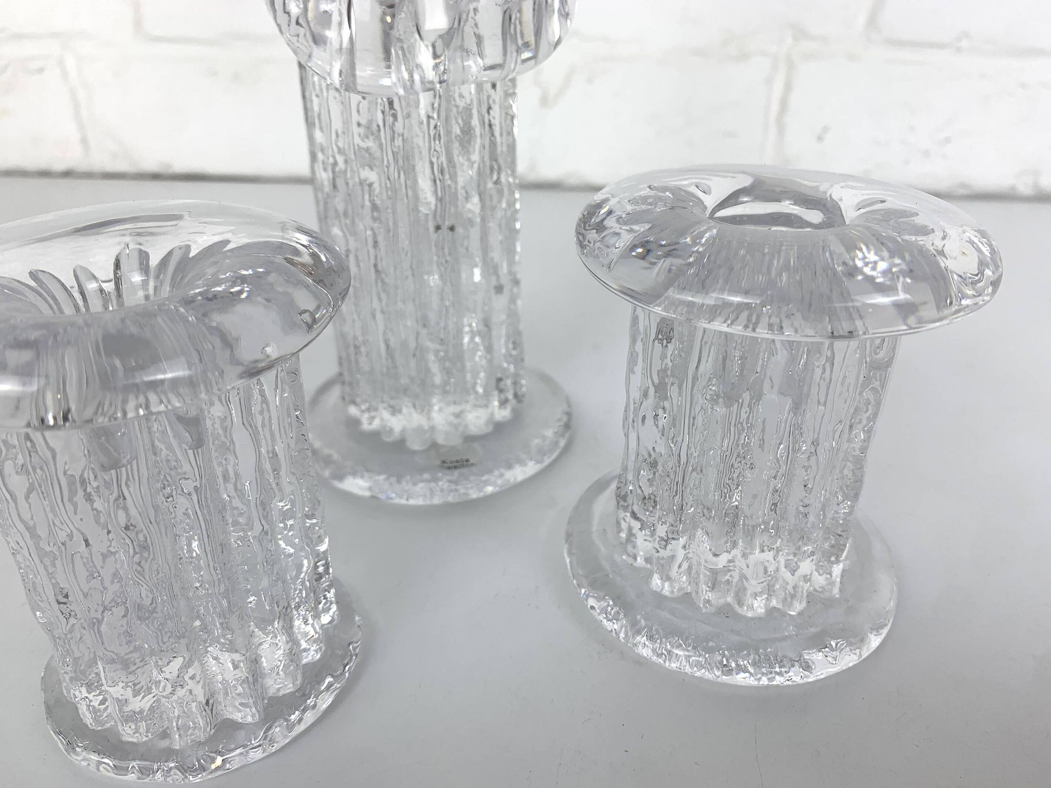 Glass candle holders by Göran Wärff for Kosta Boda, Sweden, 1970s.