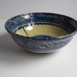 Blue enamelled terracotta cup