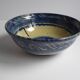 Blue enamelled terracotta cup