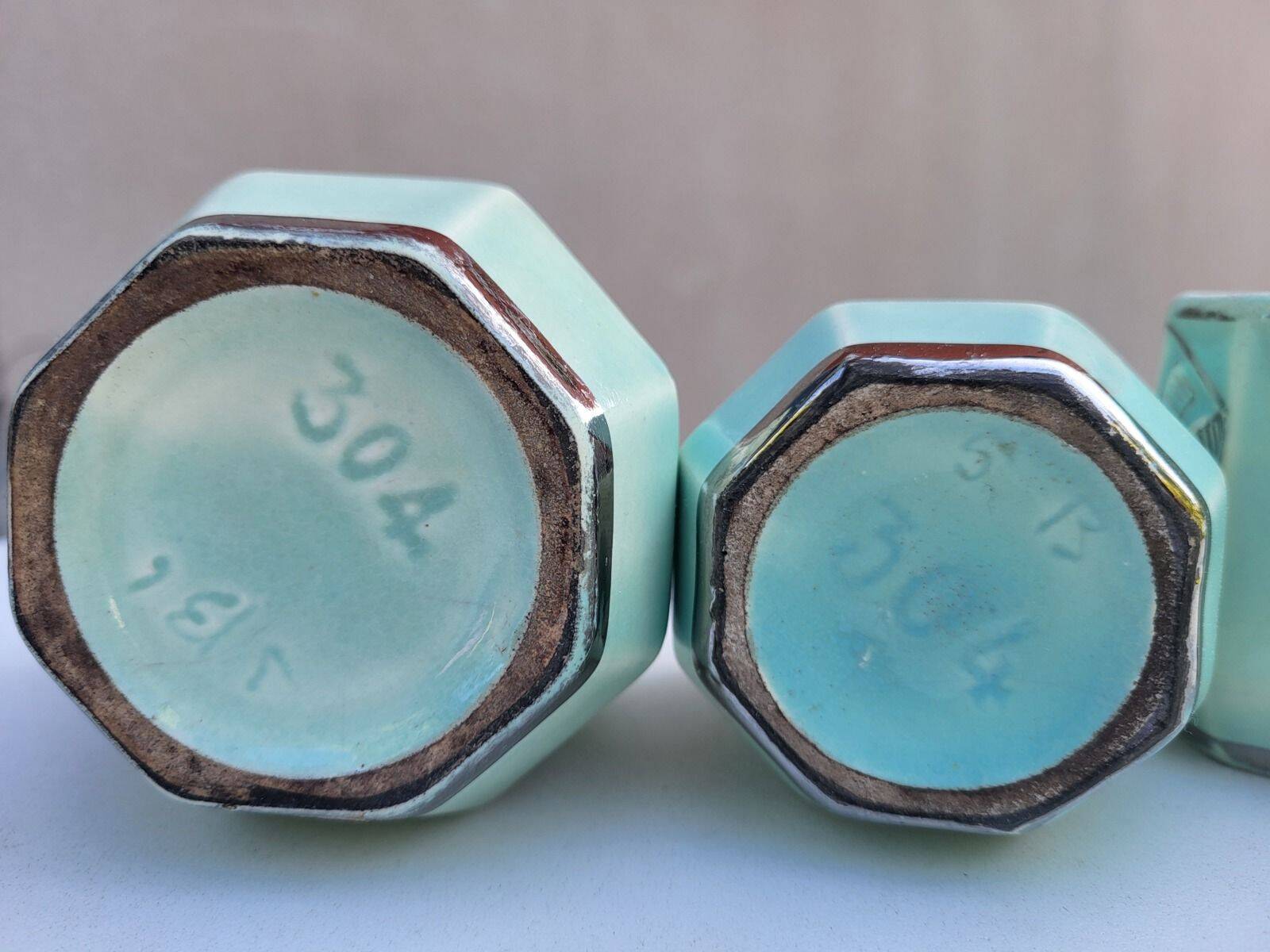 Set of 4 Art Deco celadon green and silver barbotine pots.