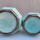 Set of 4 Art Deco celadon green and silver barbotine pots.