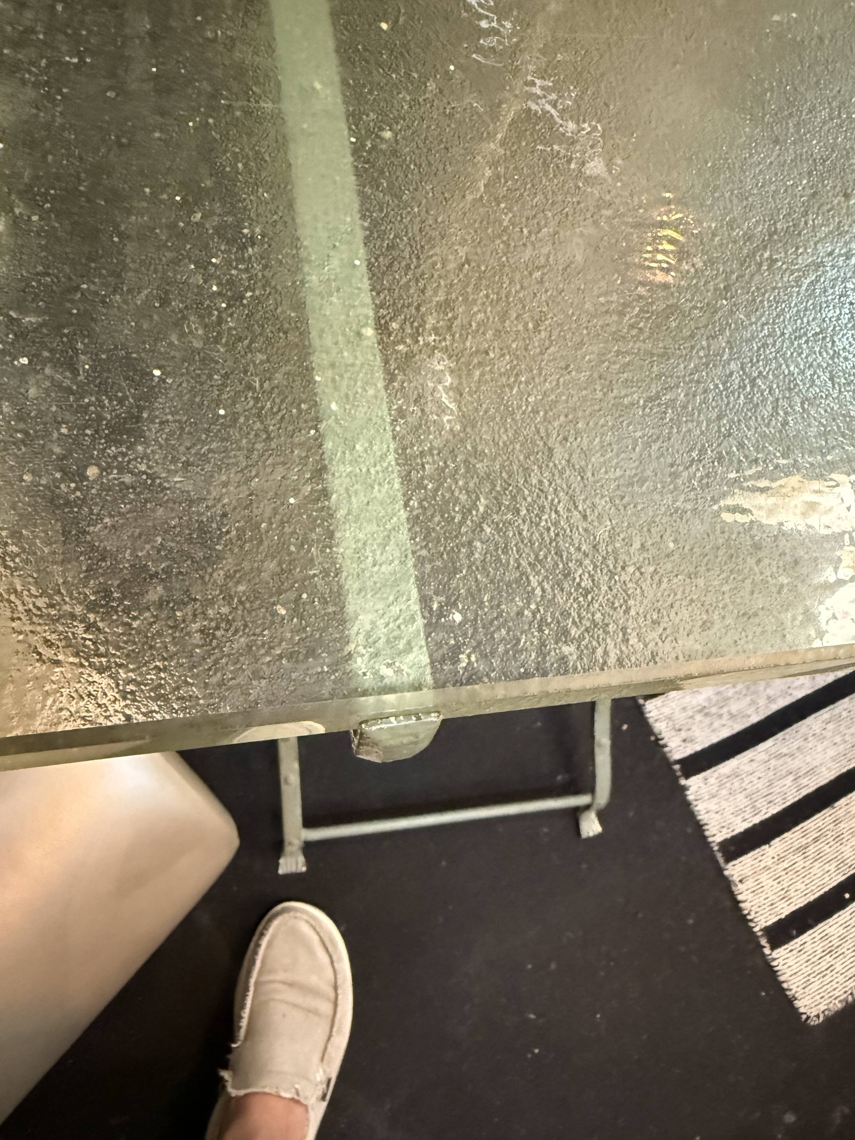Metal table with glass top