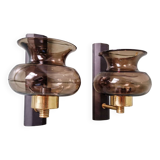 Pair of wall sconces in brass and smoked glass, 1960s.