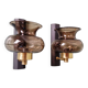 Pair of wall sconces in brass and smoked glass, 1960s.