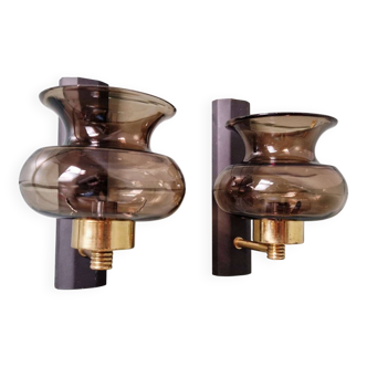 Pair of wall sconces in brass and smoked glass, 1960s.