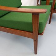 Pair of vintage Scandinavian armchairs in teak and green fabric from the 1960s.