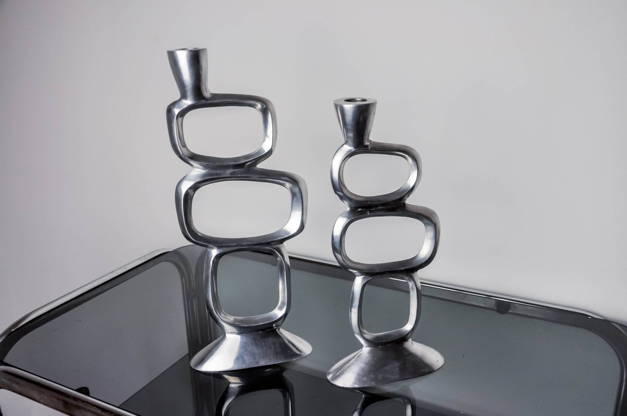 Pair of circle candlesticks by Matthew Hilton, England, 1980