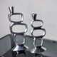 Pair of circle candlesticks by Matthew Hilton, England, 1980