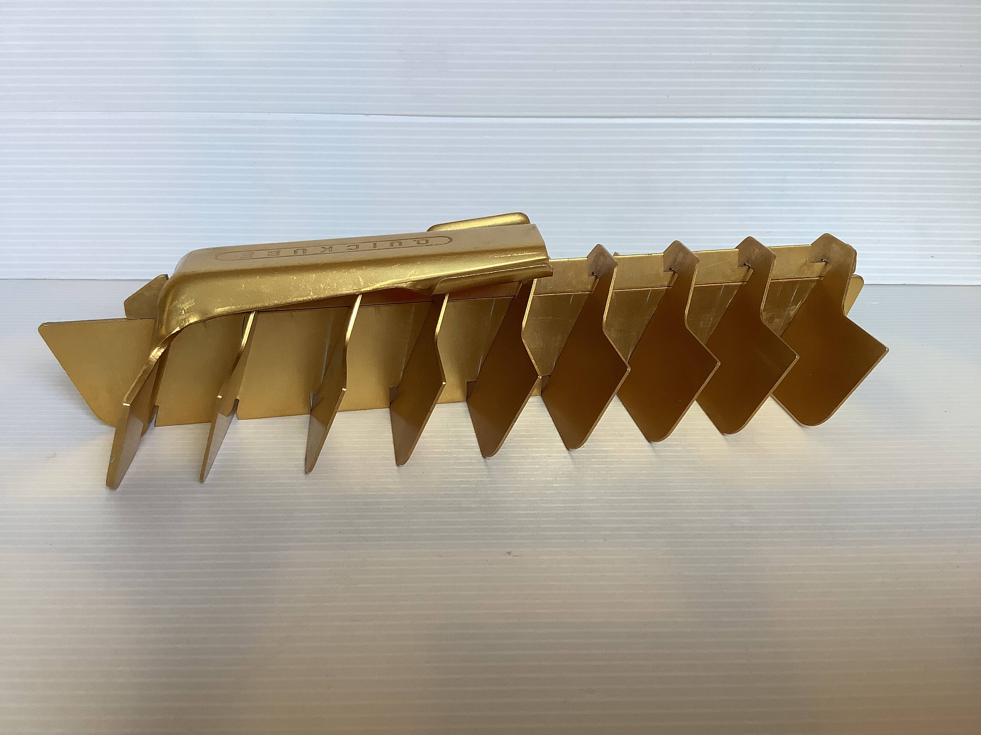 Old gold metal ice cube tray