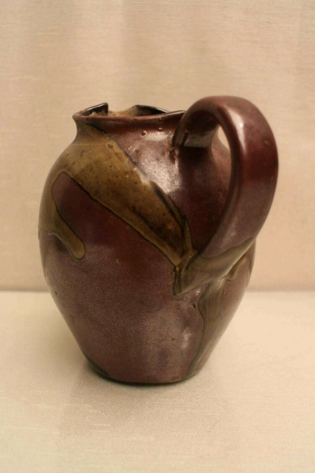 Pitcher in glazed sandstone