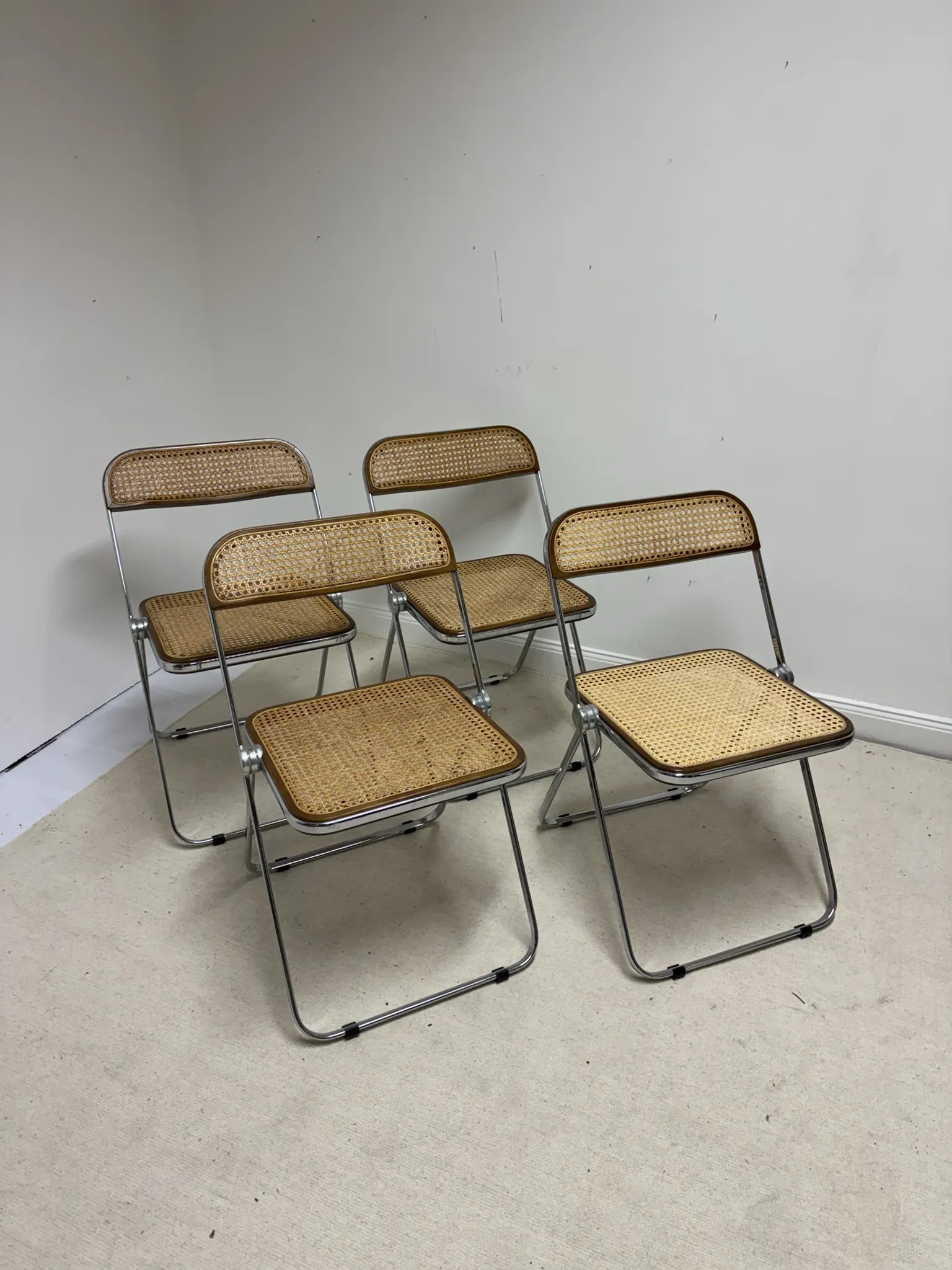 4 chaises Plia par Giancarlo Piretti