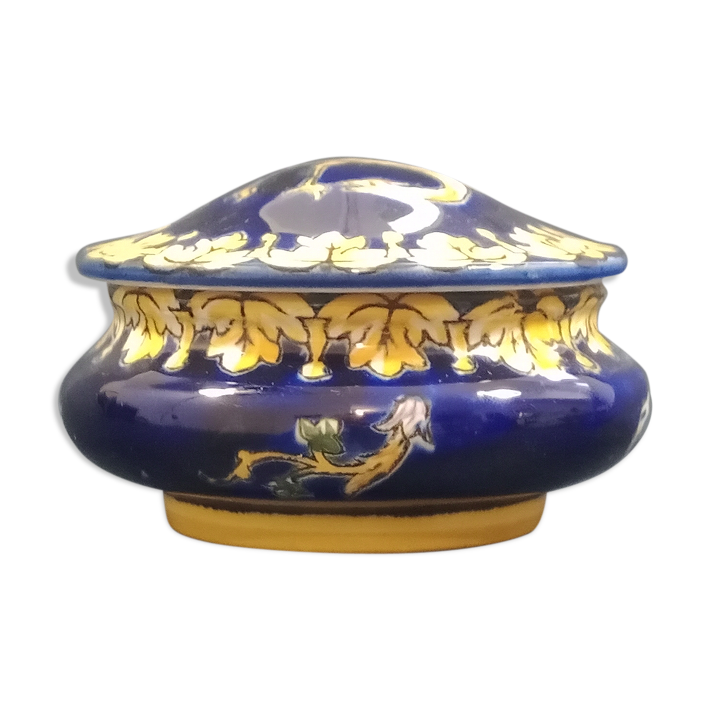 Empty Gien earthenware pocket decorated with chimera decoration