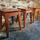 Set of 3 vintage French wooden stools from the 1950s.
