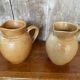 Pair antique cnp village beige & cream stoneware pitchers vintage