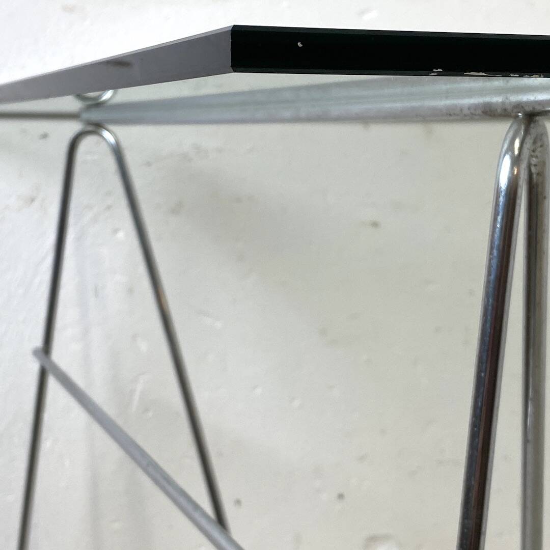 Minimalist glass and metal desk from the 1970s