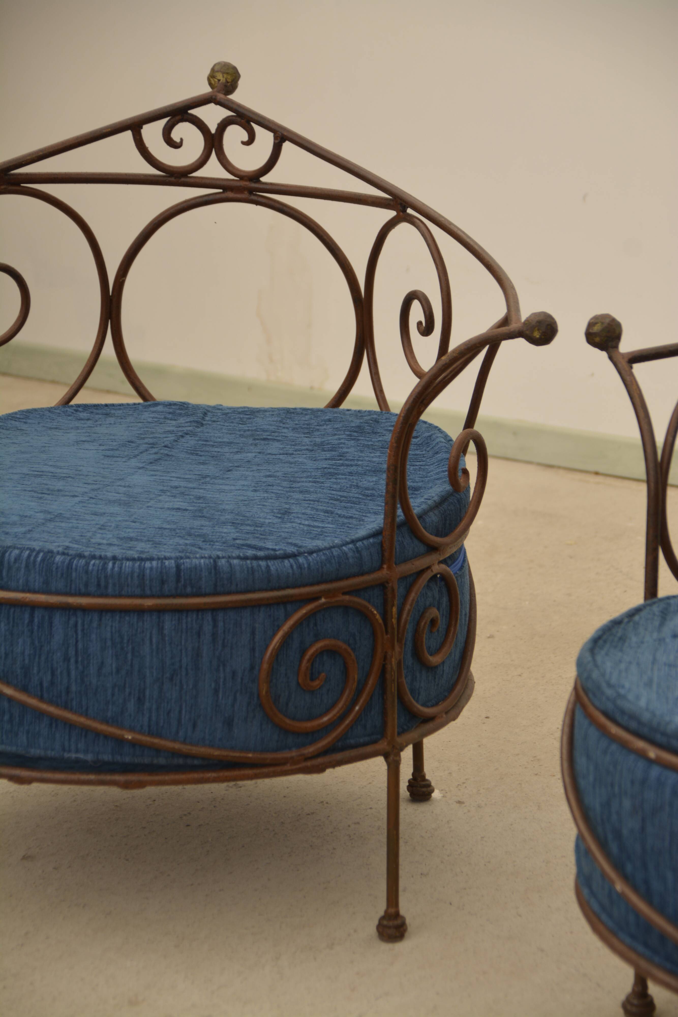 Wrought iron armchairs