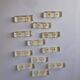 12 knife rests with resin inclusion. 1970s.