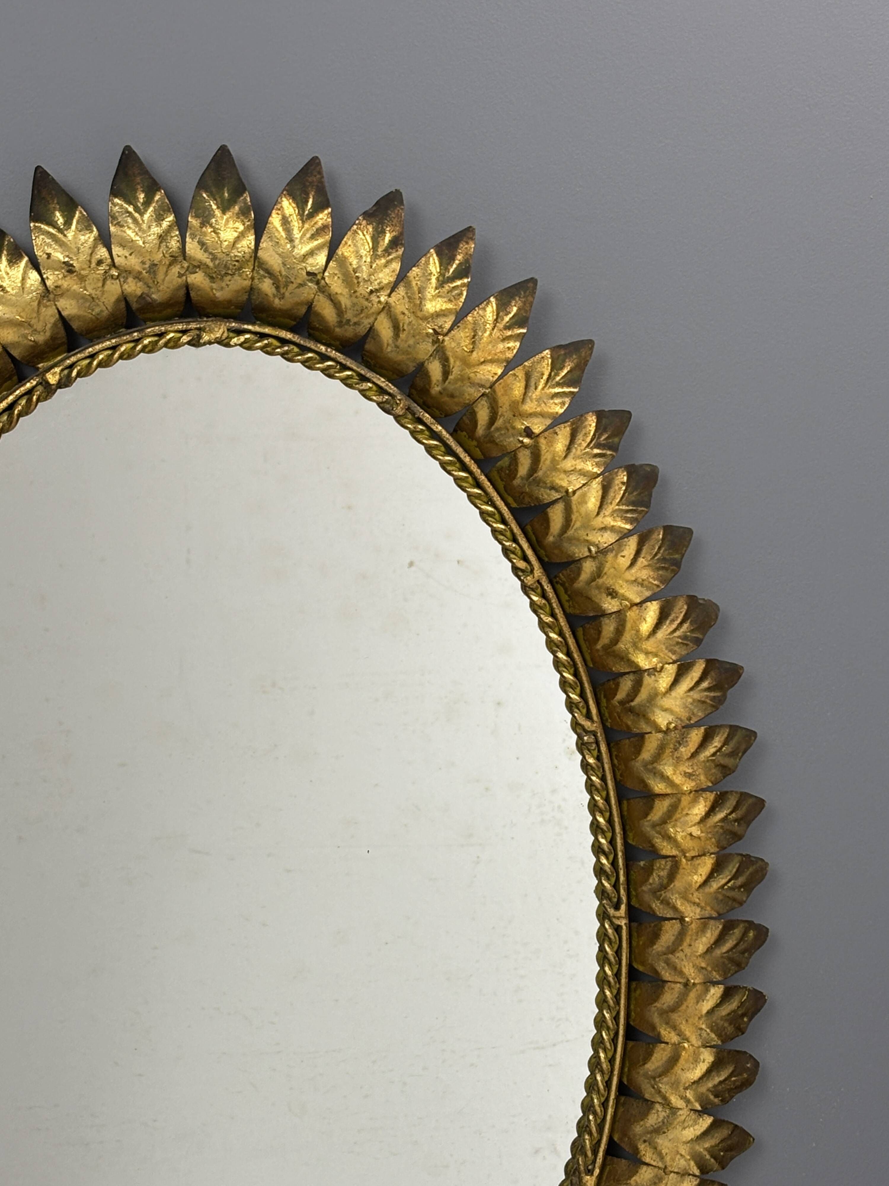 Midcentury bohemian hollywood regency spanish gilt metal sun mirror, 1960s
