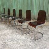 Chairs in plexiglas with chrome metal base