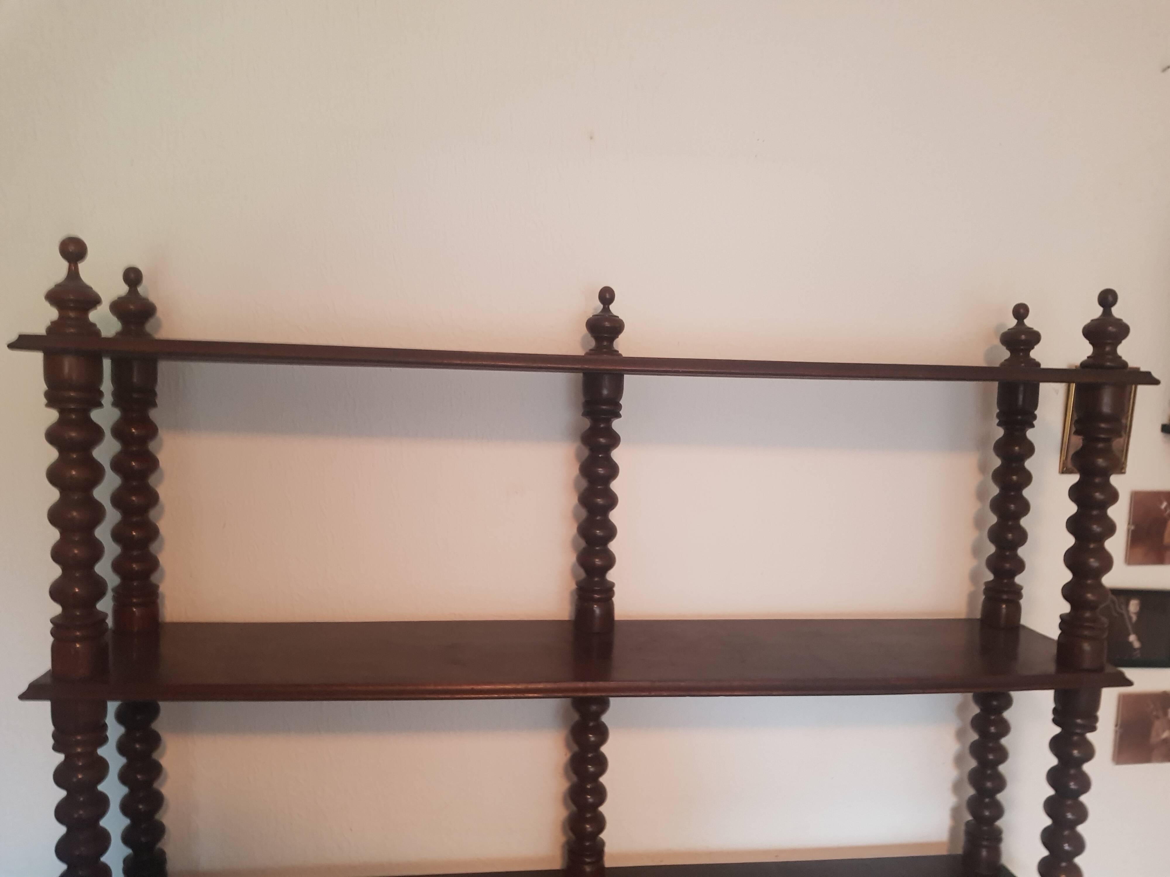 Turned wooden shelf