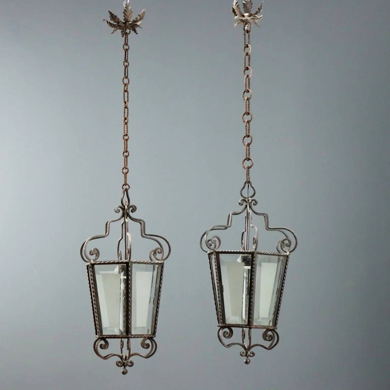 Old iron and glass lanterns, Italy, early 20th century.