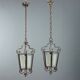 Old iron and glass lanterns, Italy, early 20th century.